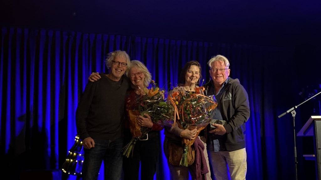 Ontvangst erepenning en bloemen